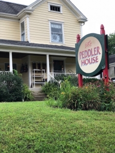 house with a sign in front